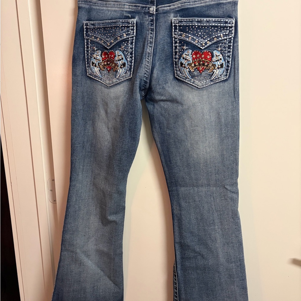 Embellished Light Blue Flare Jeans with Decorative Back Pockets